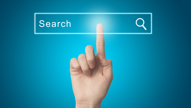 Finger pressing a search engine
