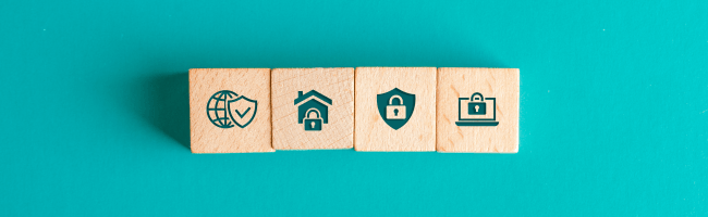 Security concept with icons on wooden blocks on turquoise table flat lay