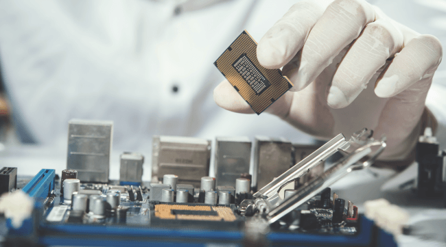 The technician repairing the computer